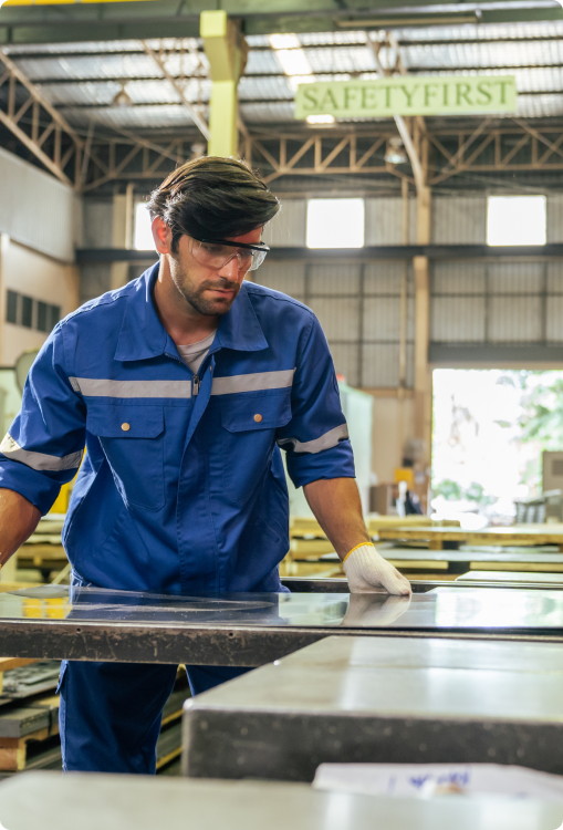 Man holding sheet metal