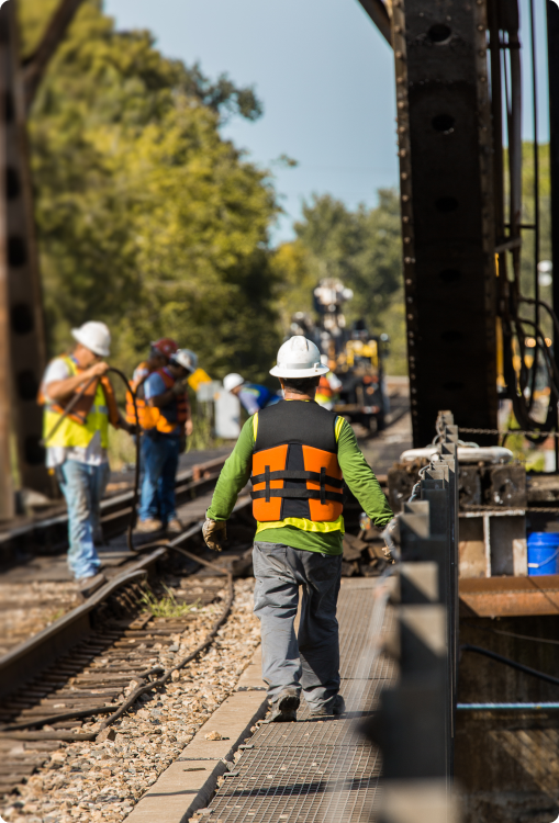 Workers working on train